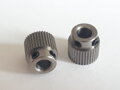 Extruder feed wheel